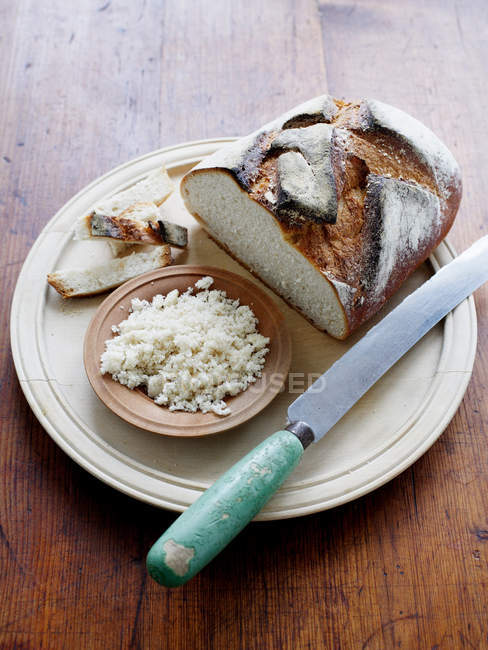 Crusty breadcrumbs on plate — Stock Photo