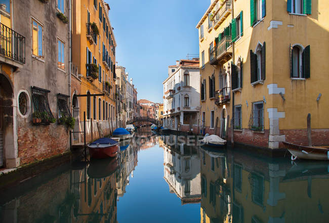 Buildings on urban canal — Stock Photo