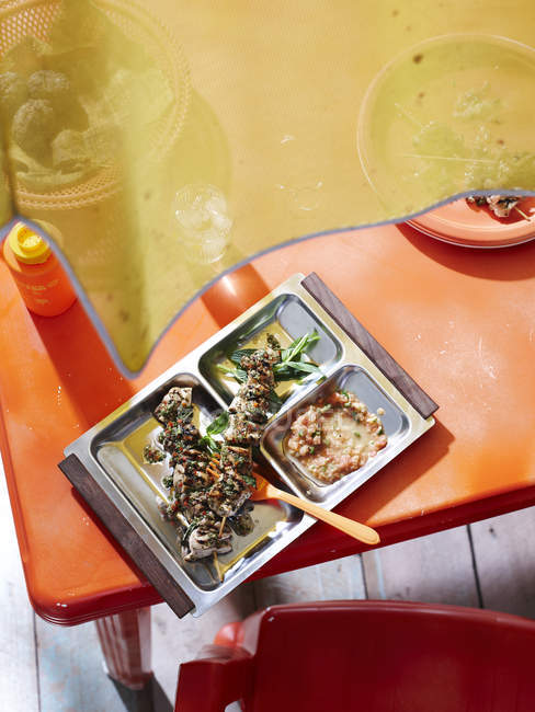 Caipirinha chicken in tray, Brazilian food — Stock Photo