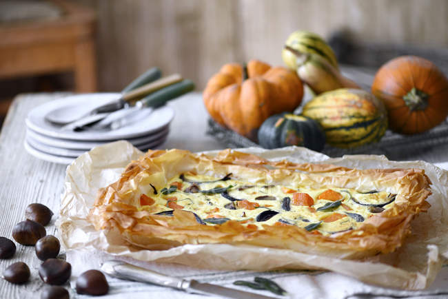 Butternut squash filo pastry tart served on table — Stock Photo