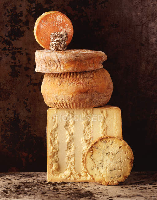 Closeup shot of stack of British cheeses — Stock Photo