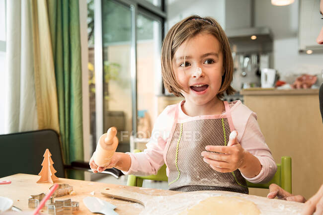 Girl with batter on nose — Stock Photo