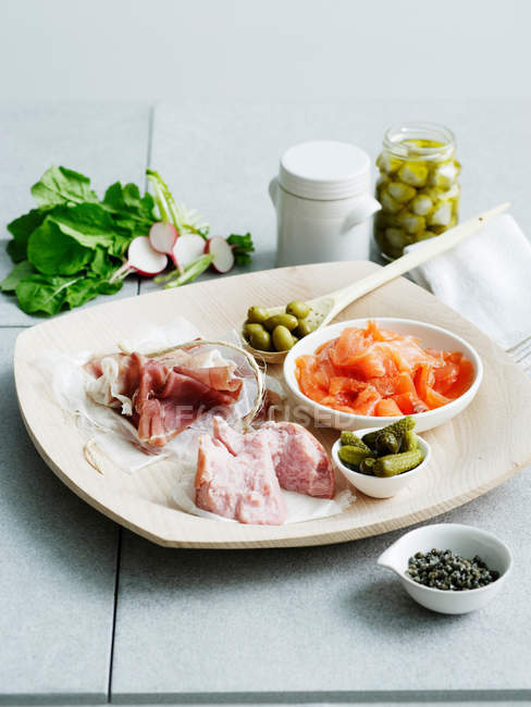 Cured meats and pickles — Stock Photo