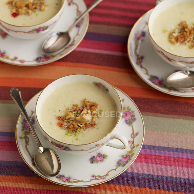 Parsnip soup in tea cups — Stock Photo