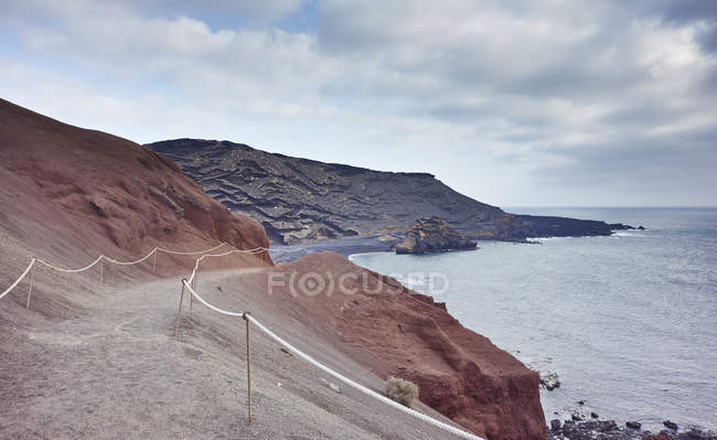 Sentiero costiero eroso, Lanzarote, Isole Canarie, Spagna — Foto stock
