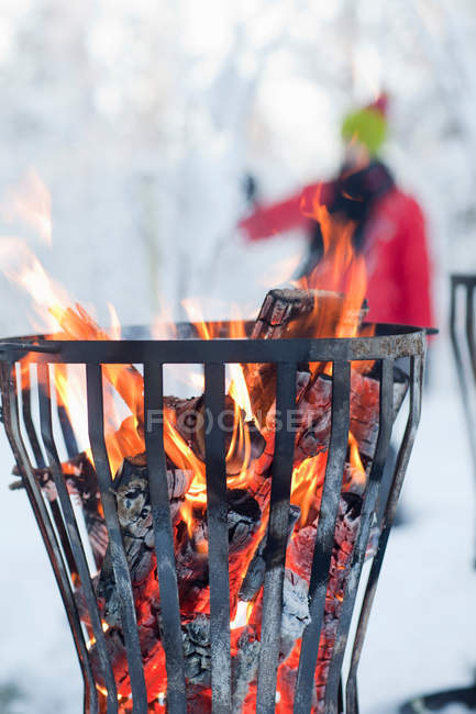 Close-up of fire in pit, focus on foreground — Stock Photo