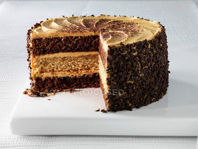 Plate with cappuccino layer cake — Stock Photo