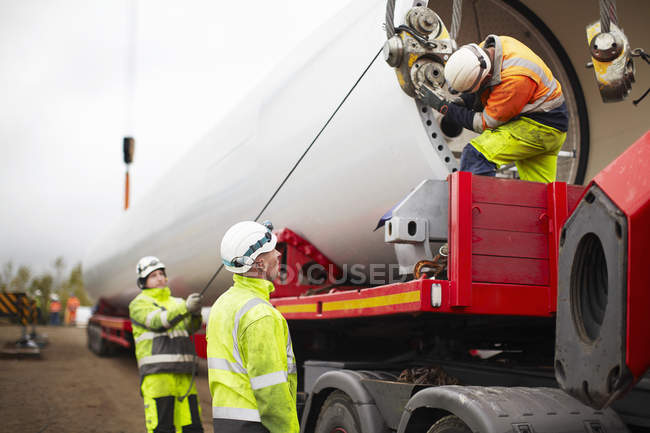 Engineers working on wind turbine construction site — Stock Photo