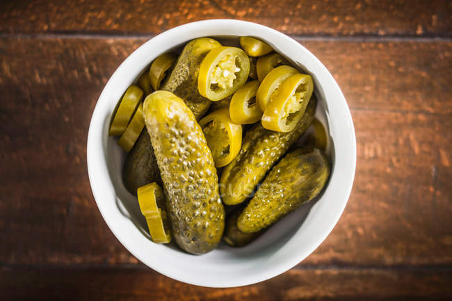 Bowl of pickles and chili pepper — Stock Photo
