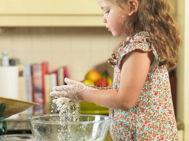Girl baking in kitchen, selective focus — Stock Photo