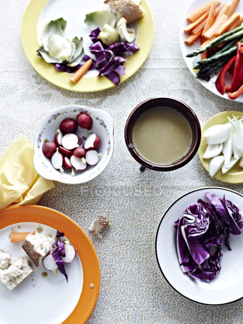 Bagna Cauda anchovy crudites on table — Stock Photo