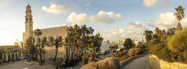Panorama of old Jaffa with St. Peter church and Monastery on the left. Tel Aviv in distance — Stock Photo