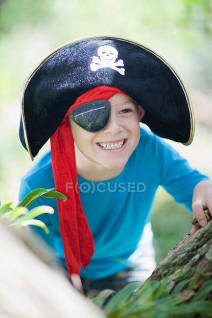 Boy playing in pirate costume — Stock Photo