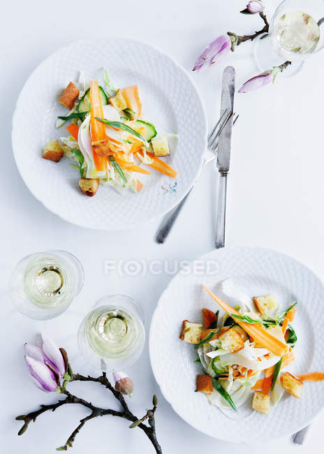 Plates of pasta with vegetables — Stock Photo