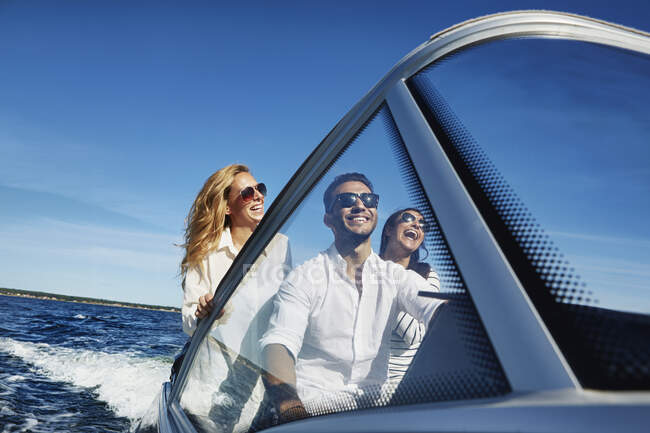 Young adults on boat, Gavle, Sweden — Stock Photo