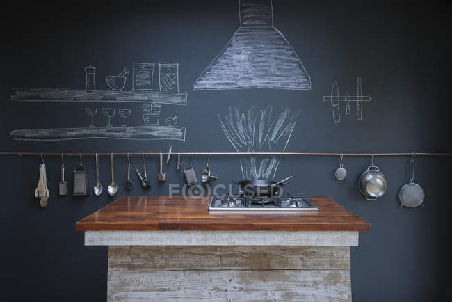 Kitchen with chalkboard wall background — Stock Photo