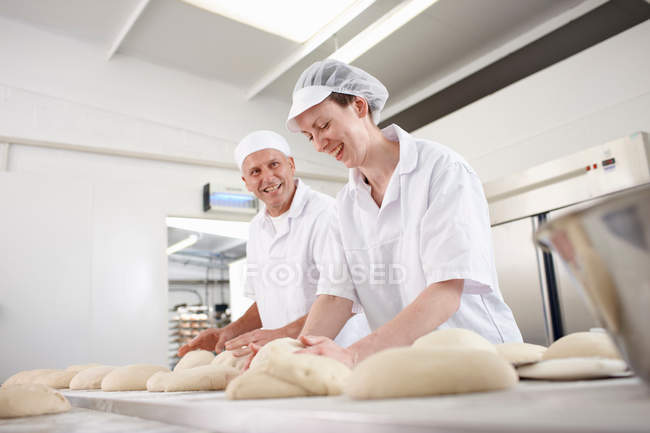 Chefs baking in kitchen, selective focus — Stock Photo