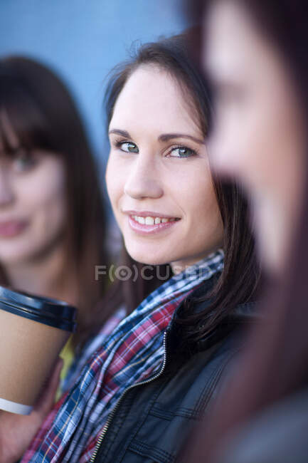 Close up portrait of young female friends — Stock Photo
