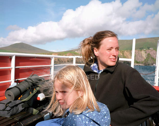 Mother and daughter riding on ferry boat — Stock Photo