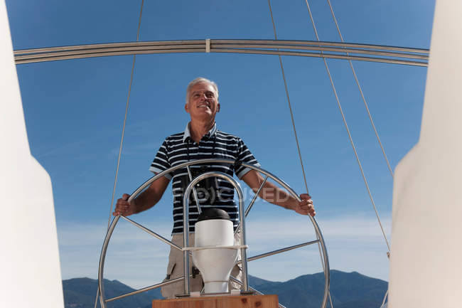 Front view of Older man sailing — Stock Photo