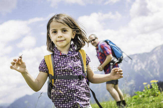 Portrait of girl with father in background, Tyrol, Austria — Stock Photo