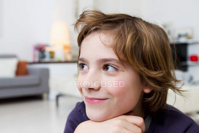 Boy smiling, focus on foreground — Stock Photo