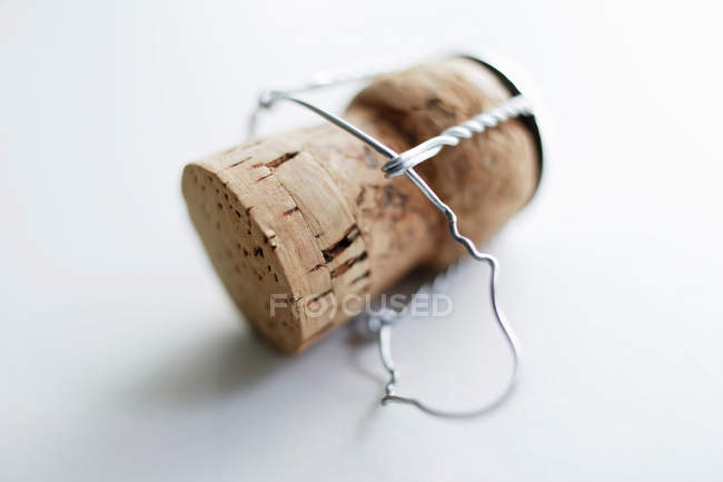 Unscrewed champagne cork — Stock Photo