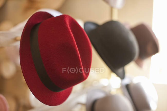 Row of hats in traditional milliners shop — Stock Photo