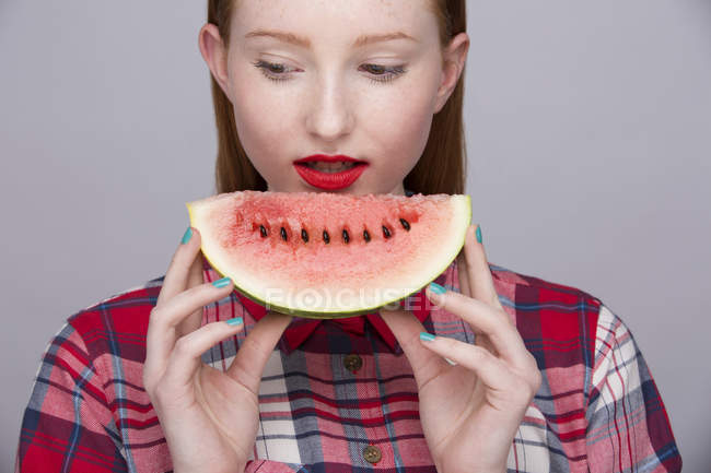 Young woman with slice of watermelon — Stock Photo