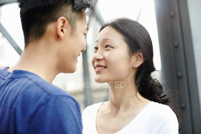 Close up of romantic tourist couple, The Bund, Shanghai, China — Stock Photo