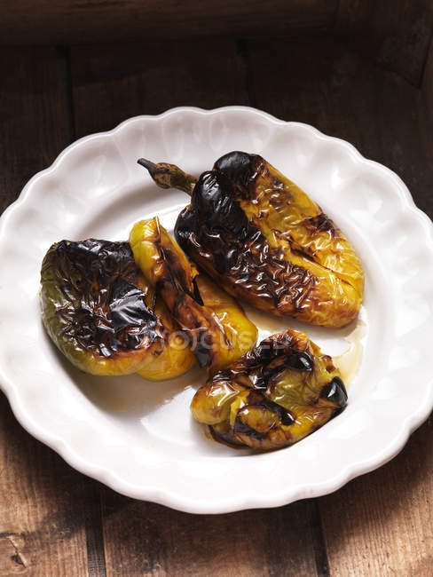 Char grilled peppers — Stock Photo