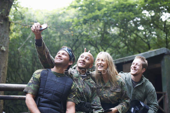 Paintball players taking selfie after game — Stock Photo