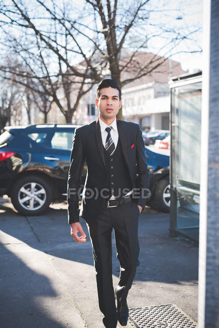 Young businessman in the street, Milan, Italy — Stock Photo