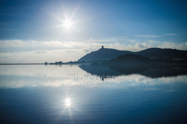 Sunlit seascape and reflection — Stock Photo