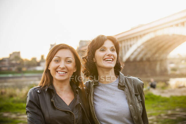 Two mid adult women smiling, portrait — Stock Photo