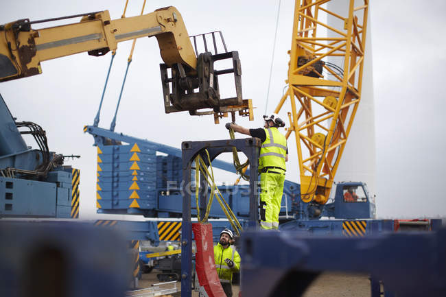 Engineers working at wind farm construction site — Stock Photo
