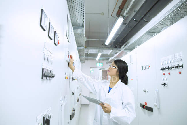 Scientist in control room — Stock Photo