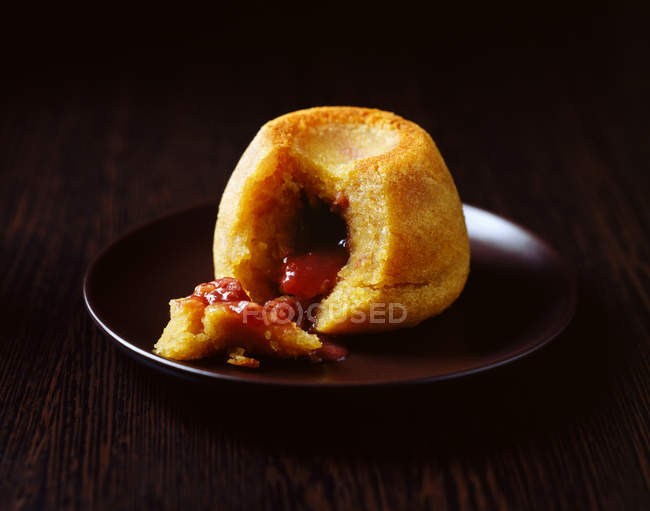 Jam steamed pudding served on plate — Stock Photo