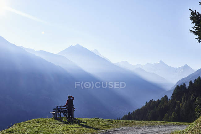 Mountain biker in mountains, Valais, Switzerland — Stock Photo