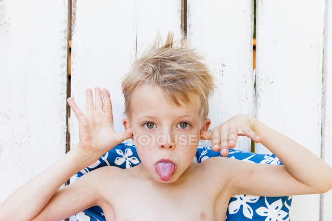 Close up of boy making face — Stock Photo