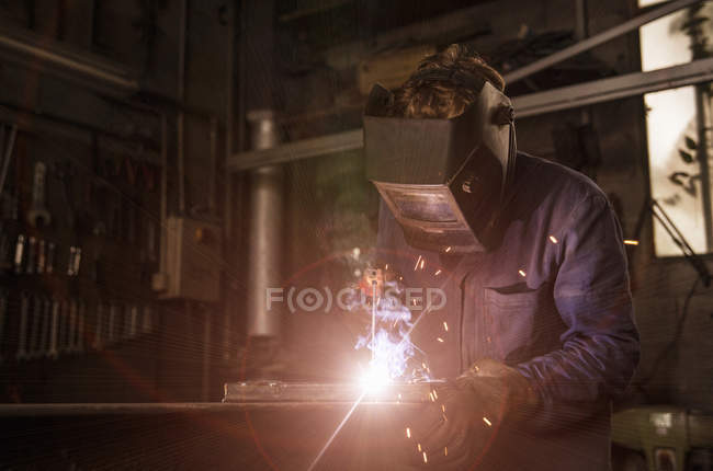 Closeup shot of welder soldering iron in workshop — Stock Photo