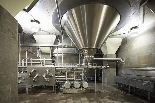 Front view of room with special machinery in brewery — Stock Photo