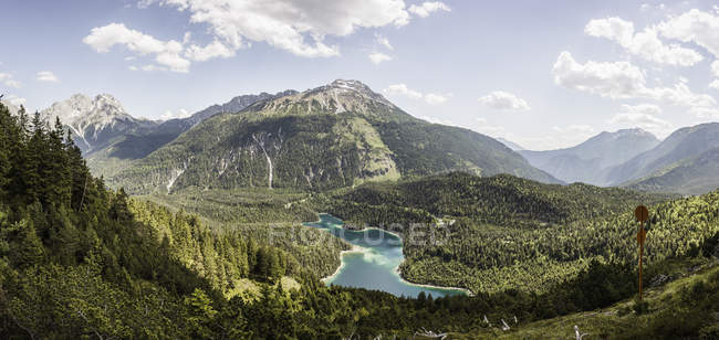 Elevated view of river flowing through mountains, Leermoos, Tyrol, Austria — Stock Photo