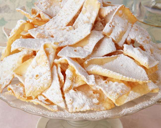 Traditional Italian party food, Chiacchiere, sweet crisp pastry — Stock Photo