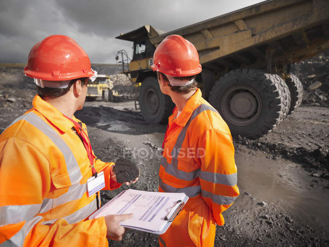 Workers Inspecting Trucks In Coal Mine Protection Hard Hat Stock Photo 167887372