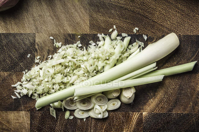 Ingredient for making green curry paste lemongrass on wooden surface — Stock Photo