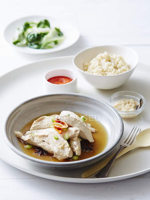 Still life of hainan chicken with steamed rice — Stock Photo