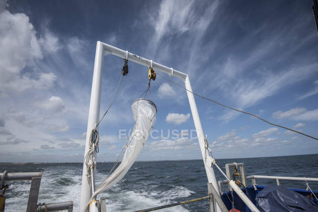 Plankton net hanging on stern of research ship — Stock Photo