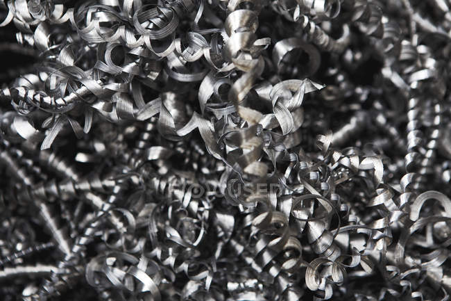 Close-up view of shiny industrial metal swarf, full frame background — Stock Photo