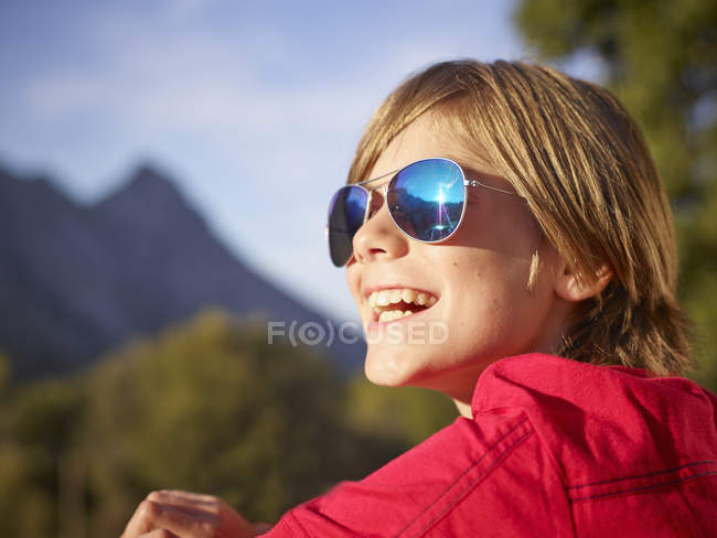 Close up portrait of boy in landscape, Majorca, Spain — Stock Photo